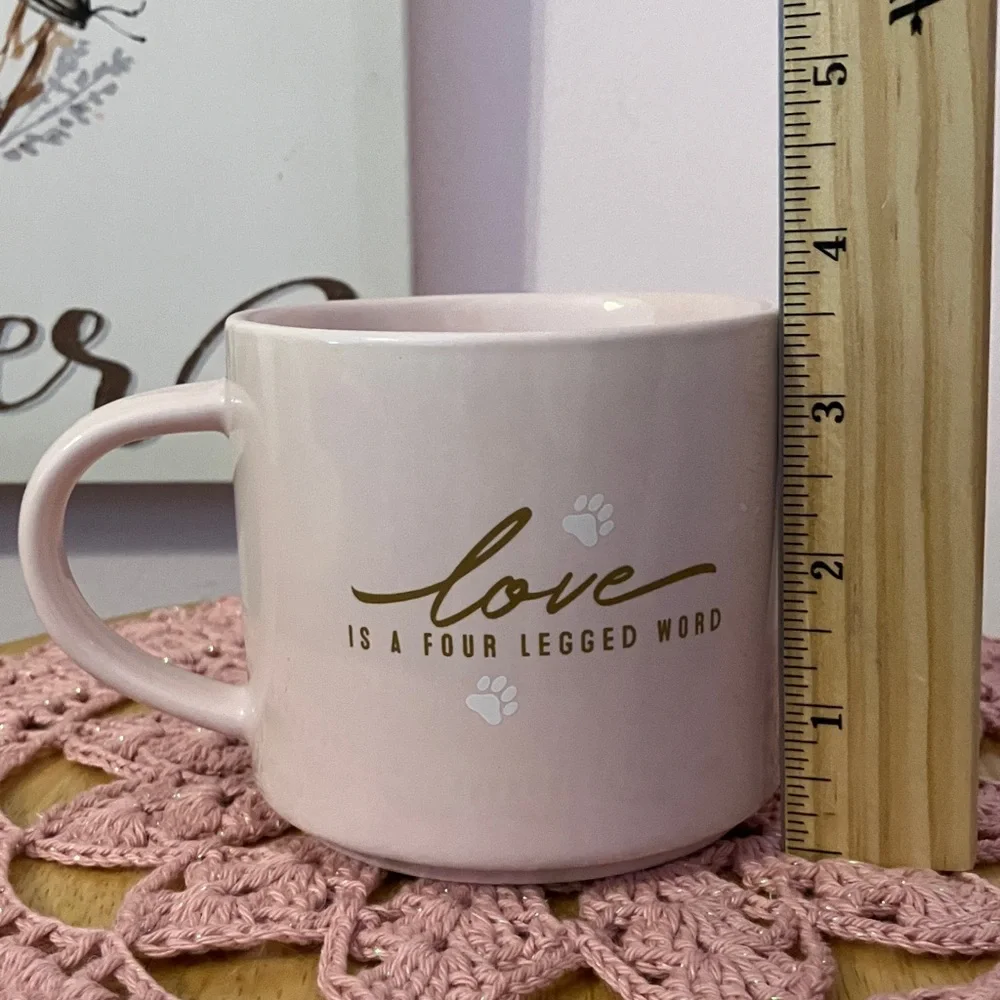 Pretty Pink Mug reads “love is a four legged word”!